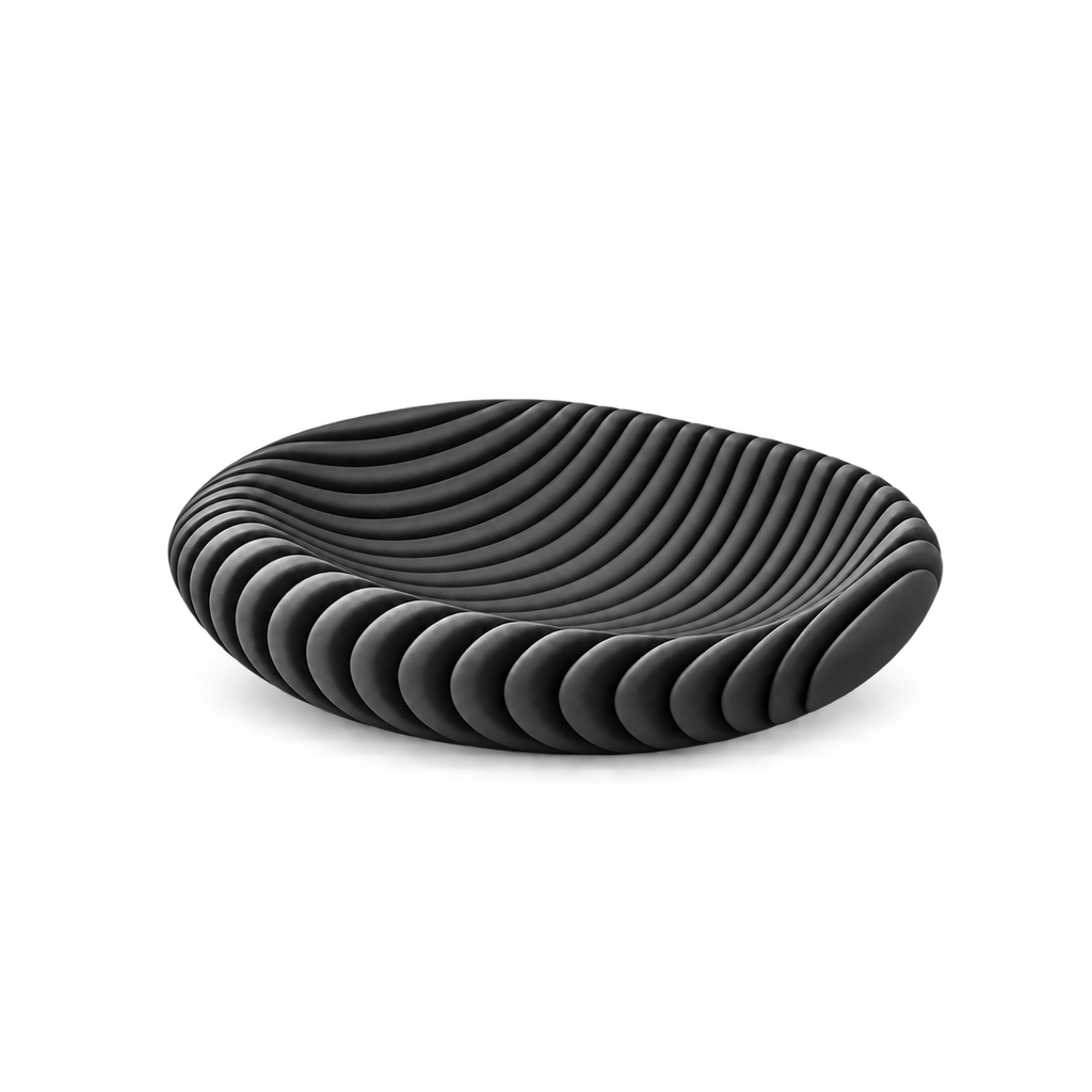 Black wavy ribbed oval bowl on a transparent background